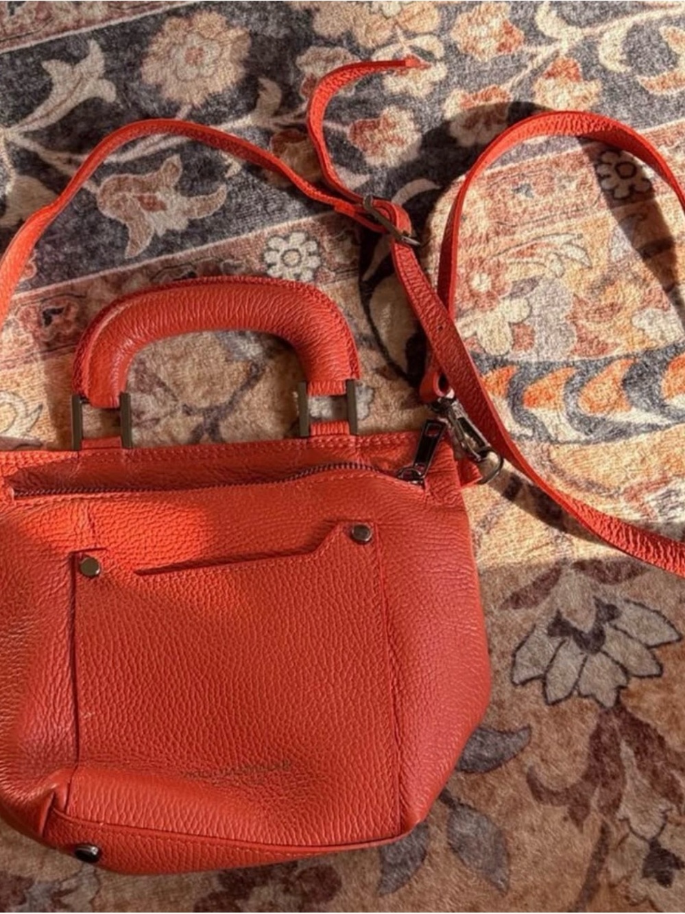 Stylish Orange Leather Crossbody Bag with Top Handle